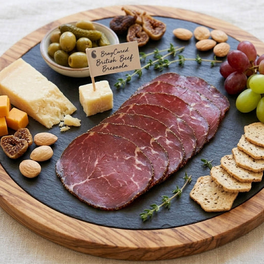 artisan charcuterie on wooden boards with warm light and earthy, rustic tones